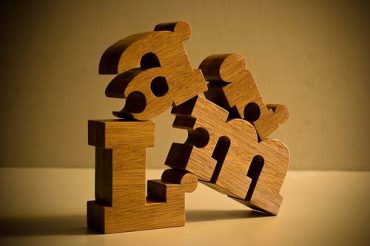 Nuzzles Wooden Name Puzzles by Etsy Seller fidodidojohn